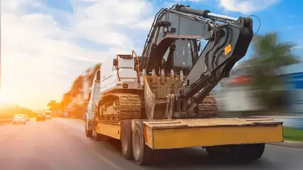 transportation-dirty-excavator-on-truck-600nw-2216726827 (3)